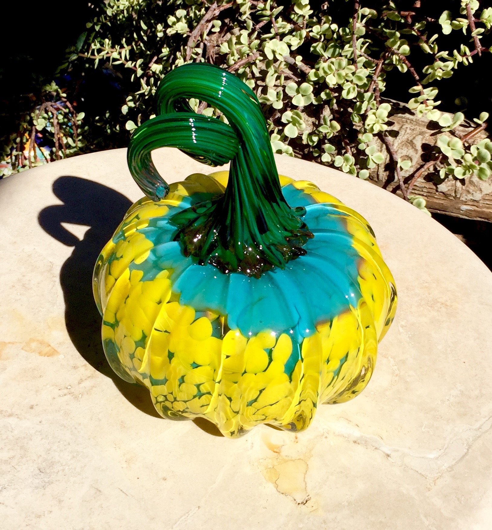 Small turquoise and yellow pumpkin